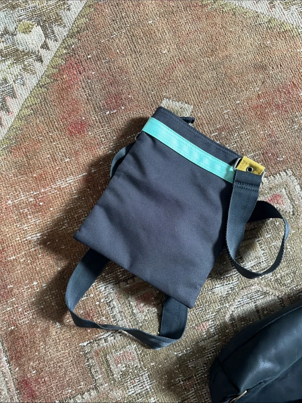 Dakine Compact Crossbody Bag in Charcoal with Teal and Yellow Accents